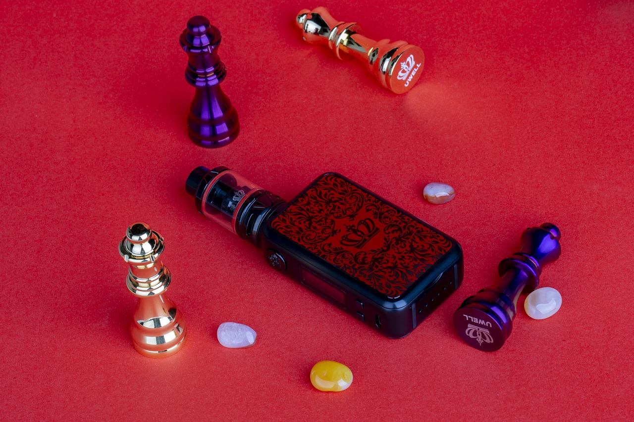 Assorted vape accessories including drip tips, cables and cases