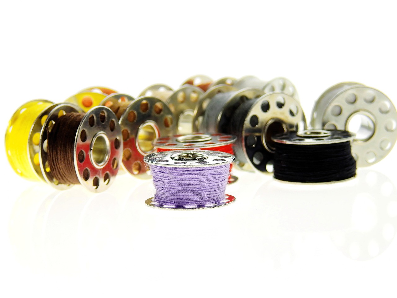 Replacement pod cartridges and coil heads laid out in bulk packaging